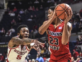 Illinois State's William Tinsley (23) grabs a rebound against Mississippi's Markel Crawford (5) during an NCAA college basketball game, in Oxford, Miss., on Saturday, Dec. 16, 2017.