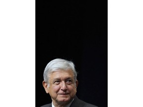 In this Monday, Nov. 20, 2017 photo, presidential hopeful Andres Manuel Lopez Obrador arrives at the National Auditorium in Mexico City. In a country obsessed with government corruption and unfulfilled promises, he is widely believed to be the least compromised candidate and his vows to never change feed his popularity, analysts say.