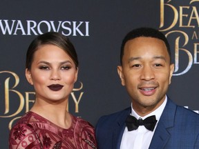 Chrissy Teigen and John Legend attending the World Premiere of Disney's 'Beauty and the Beast' at the El Capitan Theater in Los Angeles, California.