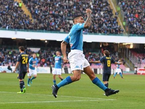 Napoli's Allan celebrates after scoring during a Serie A soccer match between Napoli and Sampdoria at the San Paolo stadium in Naples, Italy, Saturday, Dec. 23, 2017.