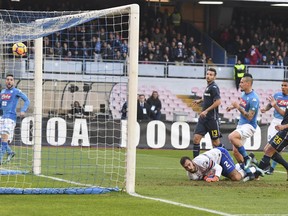 Napoli's Marek Hamsik, third from right, scores during a Serie A soccer match between Napoli and Sampdoria at the San Paolo stadium in Naples, Italy, Saturday, Dec. 23, 2017.