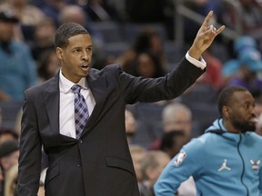 Charlotte Hornets associated head coach Stephen Silas directs his team against the Orlando Magic during the first half of an NBA basketball game in Charlotte, N.C., Monday, Dec. 4, 2017. Silas replaced head coach Steve Clifford who was sick.