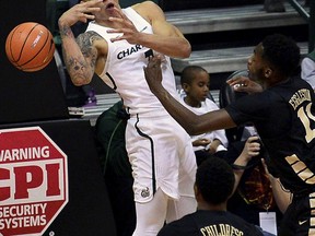 Wake Forest forward Melo Eggleston, right, pressures Charlotte forward Najee Garvin, left, to lose control of the ball during the first half of an NCAA college basketball game in Charlotte, N.C., Tuesday, Dec. 5, 2017.