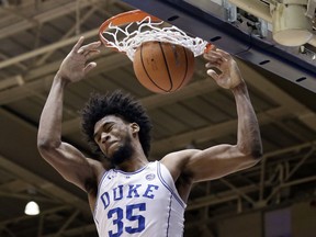 Duke's Marvin Bagley III (35) dunks during the first half of an NCAA college basketball game against South Dakota in Durham, N.C., Saturday, Dec. 2, 2017.