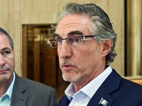FILE - In this Aug. 22, 2017, file photo, North Dakota Gov. Doug Burgum speaks at a news conference in Bismarck, N.D. Burgum was served with a lawsuit Friday, Dec. 8 that was filed by the North Dakota Legislature challenging his veto powers. The dispute arose when the governor used his line-item veto in April to change parts of several spending bills after the Legislature adjourned.