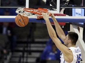 Creighton's Martin Krampelj (15) dunks during the first half of an NCAA college basketball game against USC Upstate in Omaha, Neb., Wednesday, Dec. 20, 2017.