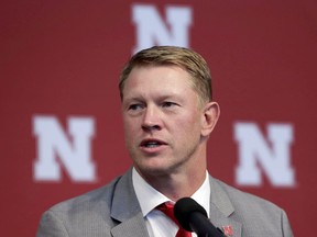 New Nebraska head NCAA college football coach Scott Frost speaks during a news conference in Lincoln, Neb., Sunday, Dec. 3, 2017. Frost is returning to Nebraska after orchestrating a stunning two-year turnaround at Central Florida. The native son quarterbacked the Cornhuskers to a share of the national championship 20 years ago. His hiring has been long anticipated by fans clamoring for the program to return to the so-called Nebraska Way. That culture yielded unprecedented success from the 1960s to 1990s under Hall of Fame coaches Bob Devaney and Tom Osborne.