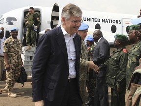Jean-Pierre Lacroix, United Nations peacekeeping chief, is welcome by U.N peacekeepers upon his arrival at Mavivi airport in Beni eastern Congo, Tuesday, Dec. 19, 2017.  The United Nations peacekeeping chief says the U.N. mission in Congo will pursue the Allied Democratic Forces rebels who killed 15 peacekeepers there earlier this month.
