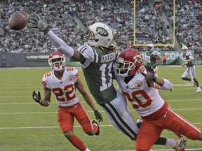Kansas City Chiefs' Steven Nelson, right, and Marcus Peters, left, defend on an incomplete pass to New York Jets' Robby Anderson during the second half of an NFL football game, Sunday, Dec. 3, 2017, in East Rutherford, N.J.