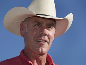 FILE - In this July 30, 2017 file photo, U.S. Interior Secretary Ryan Zinke speaks during a news conference near Gold Butte National Monument in Bunkerville, Nev. Zinke and outdoor retail giant Patagonia are trading harsh words over the Trump administration's plans to shrink several national monuments, an opening salvo in an imminent legal battle that could be waged for years. A barrage of lawsuits is expected by groups looking to block President Donald Trump's order on Monday, Dec. 4, 2017, drastically reducing Utah's Bears Ears and Grand Staircase-Escalante National Monuments.