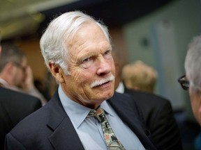 FILE - In this Friday, Dec. 6, 2013, file photo, media mogul Ted Turner talks with guests at the Captain Planet Foundation benefit gala in Atlanta.  Turner has pledged to sell an island to the state of South Carolina to supplement the severely eroding, widely popular Hunting Island State Park. On Thursday, Nov. 30, 2017,  the state Department of Parks, Recreation and Tourism has asked state legislators to pay $5 million for St. Phillips Island. Turner has owned the 4,682-acre barrier island outside Beaufort since 1979 and listed it in 2014 for $24 million. (AP Photo/David Goldman, File)