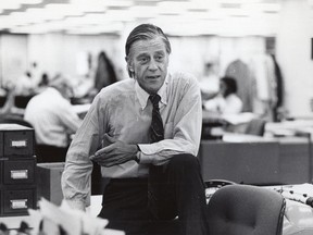 This undated photo provided by HBO shows former Washington Post Executive Editor Ben Bradlee in the newsroom in Washington. Weeks before the release of a Steven Spielberg movie about the Washington Post in the 1970s, an HBO film examines the life of that newspaper's legendary editor, Ben Bradlee. It has a strikingly contemporary feel, since the hostility Bradlee felt from the White House in the Nixon era is similar to the Trump administration today. (HBO via AP)