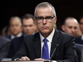 FILE - In this Wednesday, June 7, 2017 file photo, acting FBI Director Andrew McCabe appears before a Senate Intelligence Committee hearing about the Foreign Intelligence Surveillance Act, on Capitol Hill in Washington. On Saturday, Dec. 23, 2017, President Donald Trump reacted to reports  about the coming retirement of FBI Deputy Director McCabe, who has been buffeted by attacks from the president and his Republican allies over alleged anti-Trump bias in the agency, by retweeting falsehoods about McCabe's wife.
