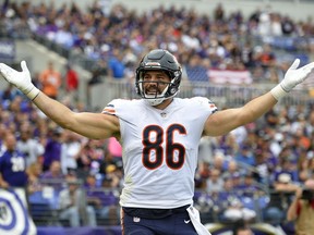 FILE - In this  Sunday, Oct. 15, 2017, file photo, Chicago Bears tight end Zach Miller celebrates after scoring a touchdown in the first half of an NFL football game against the Baltimore Ravens in Baltimore. While coaches, players, fans and broadcasters become puzzled or annoyed by the NFL's "catch rule," the people in charge of developing and refining it through the years also have struggled.