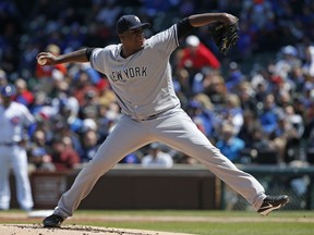 FILE - In this May 5, 2017, file photo, New York Yankees starting pitcher Michael Pineda throws against the Chicago Cubs during the first inning of an interleague baseball game, in Chicago. The Minnesota Twins have signed former New York Yankees starting pitcher Michael Pineda, Wednesday, Dec. 13, 2017, giving a two-year, $10 million contract to the right-hander recovering from Tommy John elbow ligament replacement surgery.