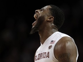 FILE - In this March 9, 2017, file photo, Florida State forward Phil Cofer (0) reacts after beating Virginia Tech in an NCAA college basketball game during the quarterfinals of the Atlantic Coast Conference tournament, in New York. After struggling the past two seasons due to injuries, senior forward Phil Cofer is finally healthy and has emerged as one of the leaders for No. 19 Florida State, which looks to equal the best start in school history on Saturday against Oklahoma State in the Orange Bowl Classic.