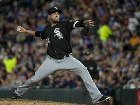 FILE - In this June 20, 2017, file photo, Chicago White Sox relief pitcher Anthony Swarzak throws to the Minnesota Twins during the sixth inning of a baseball game, in Minneapolis.  A person familiar with the contract tells The Associated Press that free-agent reliever Anthony Swarzak has reached a deal with the New York Mets. The person spoke on condition of anonymity Wednesday, Dec. 13, 2017,  at the winter meetings because Swarzak still needed to complete a physical. Swarzak is set to get $14 million over two years.