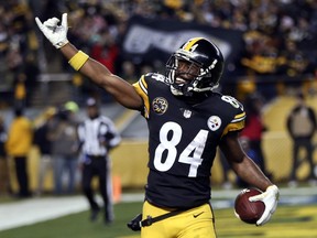 FILE - In this Nov. 26, 2017, file photo, Pittsburgh Steelers wide receiver Antonio Brown (84) celebrates during an NFL football game against the Green Bay Packers in Pittsburgh. Brown is making a push as a fringe candidate for the NFL's Most Valuable Player award. He leads the league in receptions and yards receiving heading into Sunday's visit to Cincinnati. (AP Photo/Keith Srakocic, File)