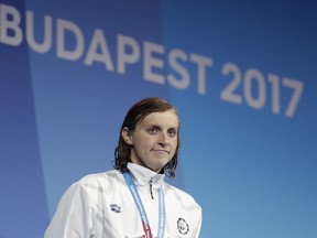 FILE - In this July 23, 2017, file photo, United States' gold medal winner Katie Ledecky smiles during the ceremony for the women's 400-meter final during the swimming competitions of the World Aquatics Championships in Budapest, Hungary. Ledecky was named The Associated Press Female Athlete of the Year on Tuesday, Dec. 26, 2017.