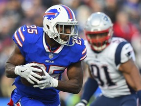 FILE - In this Dec. 3, 2017, file photo, Buffalo Bills running back LeSean McCoy (25) runs with the ball against the New England Patriots during the second half of an NFL football game in Orchard Park, N.Y. McCoy thinks so highly of Frank Gore, he is prepared to give the Indianapolis Colts veteran the jersey off his back after the Bills host Indianapolis on Sunday, Dec. 10, 2017.