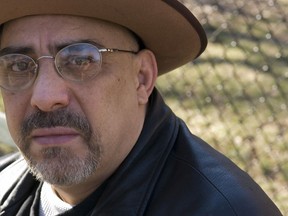 FILE - In this Feb. 3, 2007, file photo, Pat DiNizio of Smithereens poses for a photograph in New York. DiNizio, lead singer and songwriter of the New Jersey rock band died at age 62. The band announced on Facebook that DiNizio died Tuesday, Dec. 12, 2017.