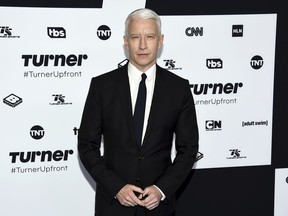 FILE - In this May 17, 2017, file photo, CNN News anchor Anderson Cooper attends the Turner Network 2017 Upfront presentation at The Theater at Madison Square Garden in New York. CNN is claiming Wednesday, Dec. 13, that Cooper's Twitter account was hacked after a tweet from his handle called the president a "pathetic loser" following Democrat Doug Jones winning Alabama's special Senate election.