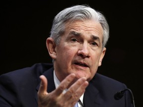 In this Tuesday, Nov. 28, 2017, photo, Jerome Powell, President Donald Trump's nominee for chairman of the Federal Reserve, testifies during his confirmation hearing before the Senate Banking, Housing, and Urban Affairs Committee on Capitol Hill in Washington. On Tuesday, Dec. 5, 2017, the Senate Banking Committee approved Powell to be the next chairman of the Federal Reserve.