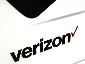 FILE - This Monday, July 25, 2016, file photo, shows signage in a Verizon store in North Andover, Mass. Now that federal telecom regulators have repealed net neutrality, it may be time to brace for the arrival of internet "fast lanes" and "slow lanes." The Associated Press queried seven major internet providers about their post-net-neutrality plans, and all of them equivocated when asked if they might establish fast and slow lanes.
