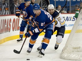 New York Islanders' Brock Nelson (29) takes control of the puck past the Buffalo Sabres' Jacob Josefson during the 1st period of an NHL hockey game, Wednesday, Dec. 27, 2017, in New York.