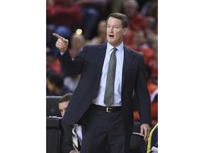 FILE - In this Dec. 20, 2016, file photo, Charlotte coach Mark Price calls to his team during the first half of an NCAA college basketball game against Maryland in Baltimore. The Charlotte 49ers fired Price on Thursday, Dec. 14, 2017. The 53-year-old Price, who was a four-time NBA All-Star guard, was in his third season with the 49ers and had a 30-42 record overall. He  was 16-20 in Conference USA play.