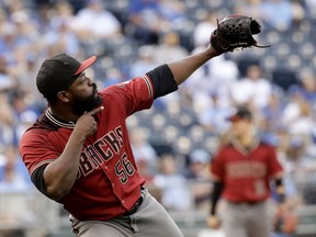 FILE - In this Oct. 1, 2017, file photo, Arizona Diamondbacks relief pitcher Fernando Rodney celebrates after a baseball game against the Kansas City Royals in Kansas City, Mo. A person familiar with the negotiations says Rodney and the Minnesota Twins have agreed to a $4.5 million, one-year contract. The person spoke on condition of anonymity to The Associated Press on Thursday, Dec. 14, 2017, because the agreement had not yet been announced. Rodney, who turns 41 on March 18 and will be in his 16th major league season, is known for firing an imaginary arrow to celebrate the final out of wins.