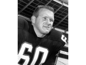 FILE - In this Dec. 13, 1966, file photo, Tommy Nobis of the Atlanta Falcons poses. Nobis, the first player ever drafted by Atlanta in 1966 and a hard-hitting linebacker who went on to spent his entire 11-year career with the team, died Wednesday, Dec. 13, 2017, after an extended illness, the team announced. He was 74. (AP Photo/File)