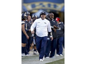 FILE - In this Nov. 24, 2017, file photo, Pittsburgh head coach Pat Narduzzi works the sideline during an NCAA college football game against Miami in Pittsburgh. Pittsburgh has signed Narduzzi to a new contract that will keep him with the Panthers through the 2024 season, the school announced Wednesday, Dec. 6, 2017. Financial details were not disclosed.