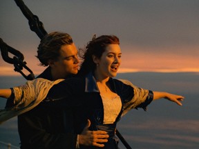 This image released by Paramount Pictures shows Leonardo DiCaprio, left, and Kate Winslet in a scene from "Titanic."  The film is among the 25 movies being added to the prestigious National Film Registry. (Paramount Pictures via AP)