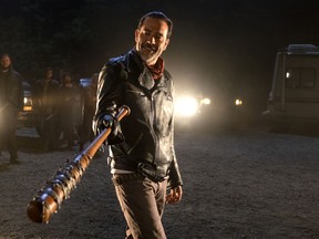 In this image released by AMC, Jeffrey Dean Morgan as Negan appears in a scene from "The Walking Dead." Morgan maintained his hitting streak as series returned in February with him back as arch-villain Negan, a grinning, swaggering brute whose non-regulation barbed-wire-wrapped baseball bat named Louise.