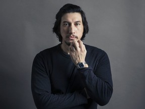 FILE - This Dec. 14, 2016 file photo shows actor Adam Driver posing for a portrait in New York. Driver, 34, reprises his role as the conflicted Kylo Ren in "Star Wars: The Last Jedi," out Friday.