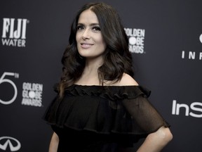 FILE - In this Nov. 15, 2017 file photo, actress Salma Hayek attends the HFPA and InStyle Celebrate the 2018 Golden Globe Awards Season in West Hollywood, Calif. In an op-ed, Hayek says that her refusals of Harvey Weinstein's advances led to a nightmare experience making the 2002 Frida Kahlo biopic.