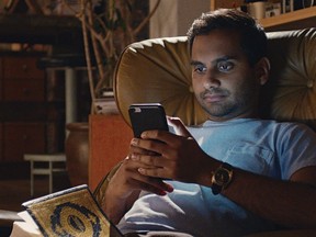 This image released by Netflix shows Aziz Ansari in "Master of None." Ansari was nominated for a Golden Globe award for best actor in a comedy or musical series or motion picture made for TV on Monday, Dec. 11, 2017. The 75th Golden Globe Awards will be held on Sunday, Jan. 7, 2018 on NBC. (Netflix via AP)