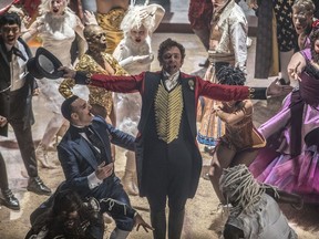 This image released by Twentieth Century Fox shows Hugh Jackman in a scene from "The Greatest Showman."