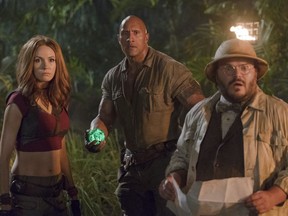 This image released by Sony Pictures shows Karen Gillan, from left, Dwayne Johnson and Jack Black in "Jumanji: Welcome to the Jungle."