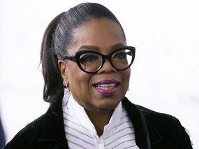 FILE - In this Oct. 21, 2017 file photo, Oprah Winfrey arrives for the David Foster Foundation 30th Anniversary Miracle Gala and Concert, in Vancouver, British Columbia. Winfrey will be the recipient of the Cecil B. DeMille Award at January's Golden Globes.
