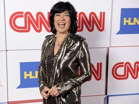 FILE - In this Jan. 10, 2014, file photo, Christiane Amanpour of CNN reacts to photographers at the CNN Worldwide All-Star Party in Pasadena, Calif. Amanpour is helping PBS fill the gap created by Charlie Rose's exit. On an interim basis, public TV stations will be able to air Amanpour's weekday public affairs program that originates on CNN International.