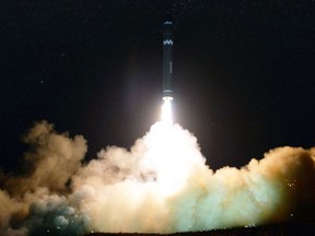 In this image provided on Thursday, Nov. 30, 2017, by the North Korean government, what the North Korean government calls the Hwasong-15, a "significantly more" powerful, nuclear-capable intercontinental ballistic missile, is launched in North Korea on Wednesday, Nov. 29. Independent journalists were not given access to cover the event depicted in this image distributed by the North Korean government. The content of this image is as provided and cannot be independently verified. Korean language watermark on image as provided by source reads: "KCNA" which is the abbreviation for Korean Central News Agency. (Korean Central News Agency/Korea News Service via AP)