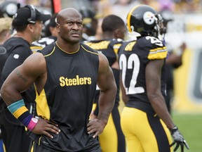 In this Oct. 8, 2017, photo, Pittsburgh Steelers outside linebacker James Harrison walks the sidelines as his team plays against the Jacksonville Jaguars in an NFL football game in Pittsburgh. Harrison's long tenure with the Steelers is over. The AFC North champions released the five-time Pro Bowl linebacker and 2008 NFL defensive player of the year to make room for right tackle Marcus Gilbert.