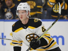 Boston Bruins forward Danton Heinen (43) skates prior to the first period of an NHL hockey game against the Buffalo Sabres, Tuesday Dec.19, 2017, in Buffalo, N.Y.