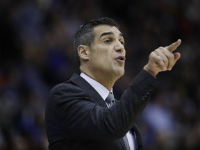 Villanova head coach Jay Wright talks to his team during the first half of an NCAA college basketball game against Hofstra, Friday, Dec. 22, 2017, in Uniondale, N.Y.