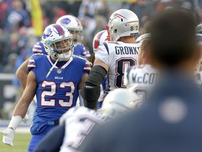 Buffalo Bills strong safety Micah Hyde (23) argues with New England Patriots tight end Rob Gronkowski (87) during the second half of an NFL football game, Sunday, Dec. 3, 2017, in Orchard Park, N.Y.