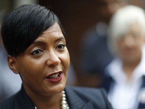 FILE - In this Nov. 7, 2017 file photo, Atlanta city councilwoman and mayoral candidate Keisha Lance Bottoms talks to the press after voting at a polling site in Atlanta. Voters in the Tuesday, Dec. 5, runoff for Atlanta mayor are deciding between Mary Norwood and Bottoms.