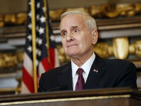 FILE- In this April 7, 2017, file photo, Minnesota Gov. Mark Dayton listens to a question from the media Friday, April 7, 2017, in St. Paul, Minn. Dayton was set to appoint a replacement Wednesday, Dec. 13, for Sen. Al Franken amid pressure to choose someone who could keep the seat in Democratic hands in a special election next November.