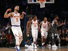 New York Knicks guard Courtney Lee (5) celebrates after hitting a three-point basket in the fourth quarter of an NBA basketball game against the Brooklyn Nets, Thursday, Dec. 14, 2017, in New York.